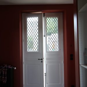 conception d'une porte isolante à partir des grilles d'origine