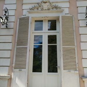 Porte 1 vantail sur pivot avec imposte